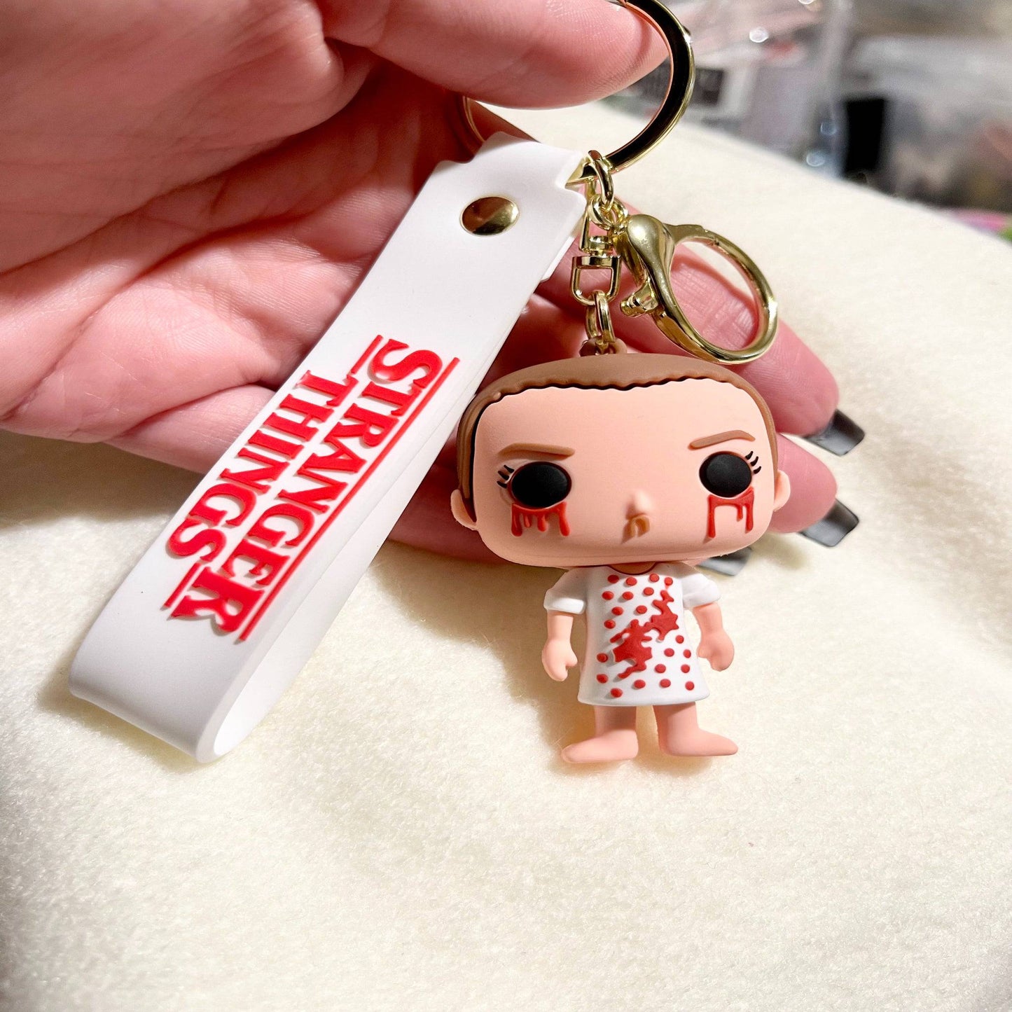 Stranger Things Eleven Keychain.
